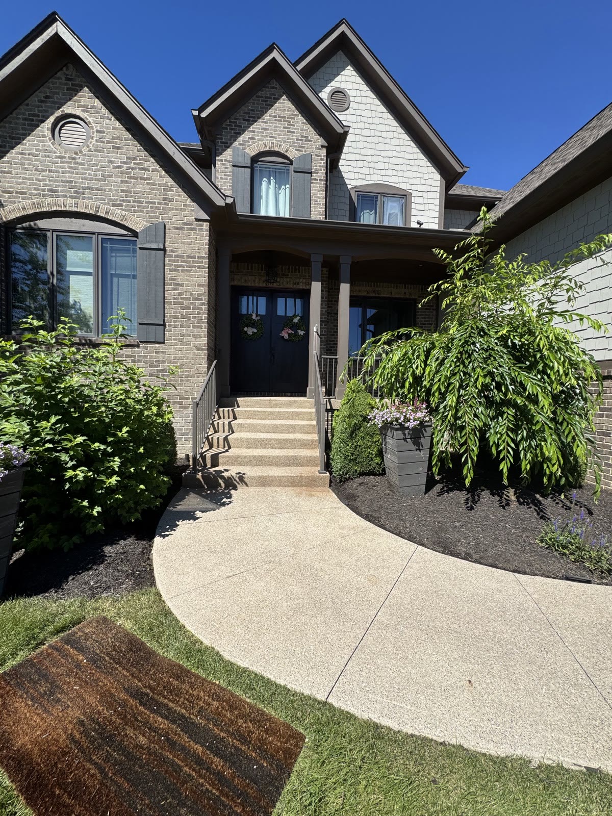 Backyard pool with clean surrounding concrete
