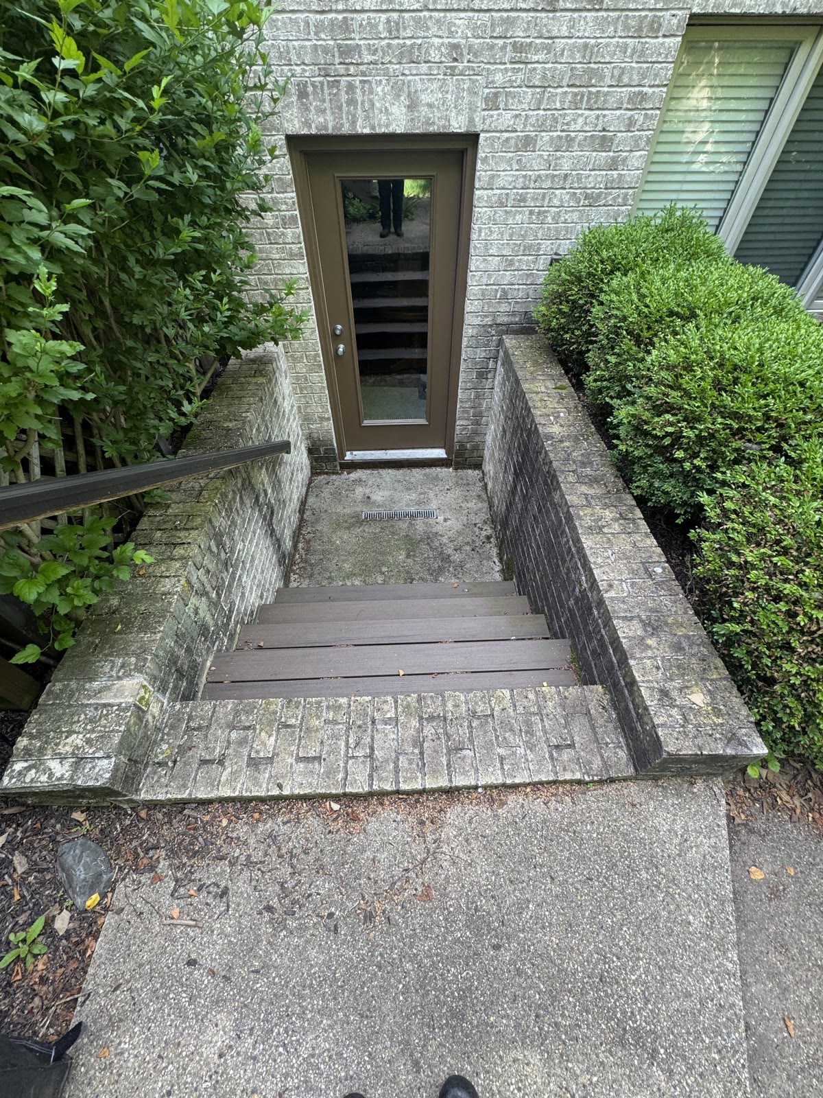 Stone walkway and garden beds